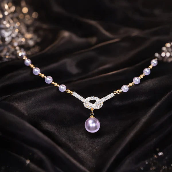 Elegant Infinity Pearl Necklace with Crystal Pendant