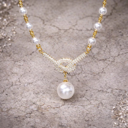 Elegant Infinity Pearl Necklace with Crystal Pendant