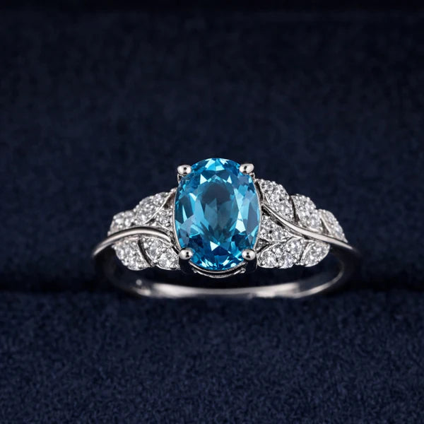 Elegant Oval Blue Topaz Silver Ring with Diamond Accents