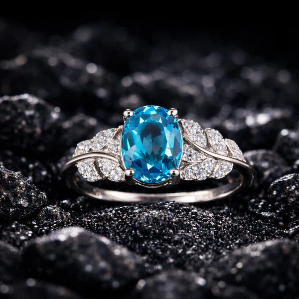 Elegant Oval Blue Topaz Silver Ring with Diamond Accents
